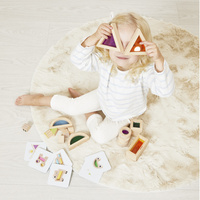 Janod Klocki drewniane przeźroczyste kolorowe sensoryczne 12 m+